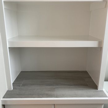 S-N-S Remodeling - After: the shelves they built in place of the missing cabinet. - General Contractors Near Me S-N-S Remodeling - After: the shelves they built in place of the missing cabinet. - General Contractors Near Me