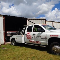 24/7 On Call Towing - 84 Ford Bronco tucked away safe and sound.
