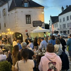 Maison du Colombier - Outside the restaurant/café, listening to the band. We were fortunate to have been inside where it was a bit quieter.