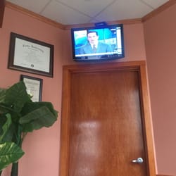 Dental Zone - tv situation, door that leads to where the work happens