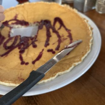 Toast Kitchen & Bar - Pancake with berry coulis - Breakfast & Brunch Near Me - Brea, California Toast Kitchen & Bar - Pancake with berry coulis - Breakfast & Brunch Near Me - Brea, California