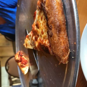Pine Stump - a slice of pizza on a plate - Burgers Near Me - Newberry, Michigan Pine Stump - a slice of pizza on a plate - Burgers Near Me - Newberry, Michigan