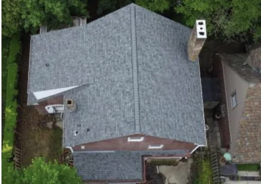 Slide of Maxim Roofing & Restoration