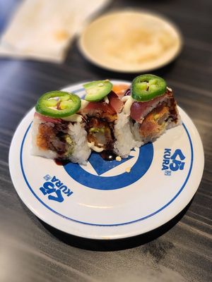 Kura Revolving Sushi Bar by null