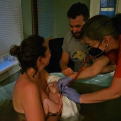 Seattle Home Maternity Service & Childbirth Center - Heather making sure our baby was in great health at our home birth