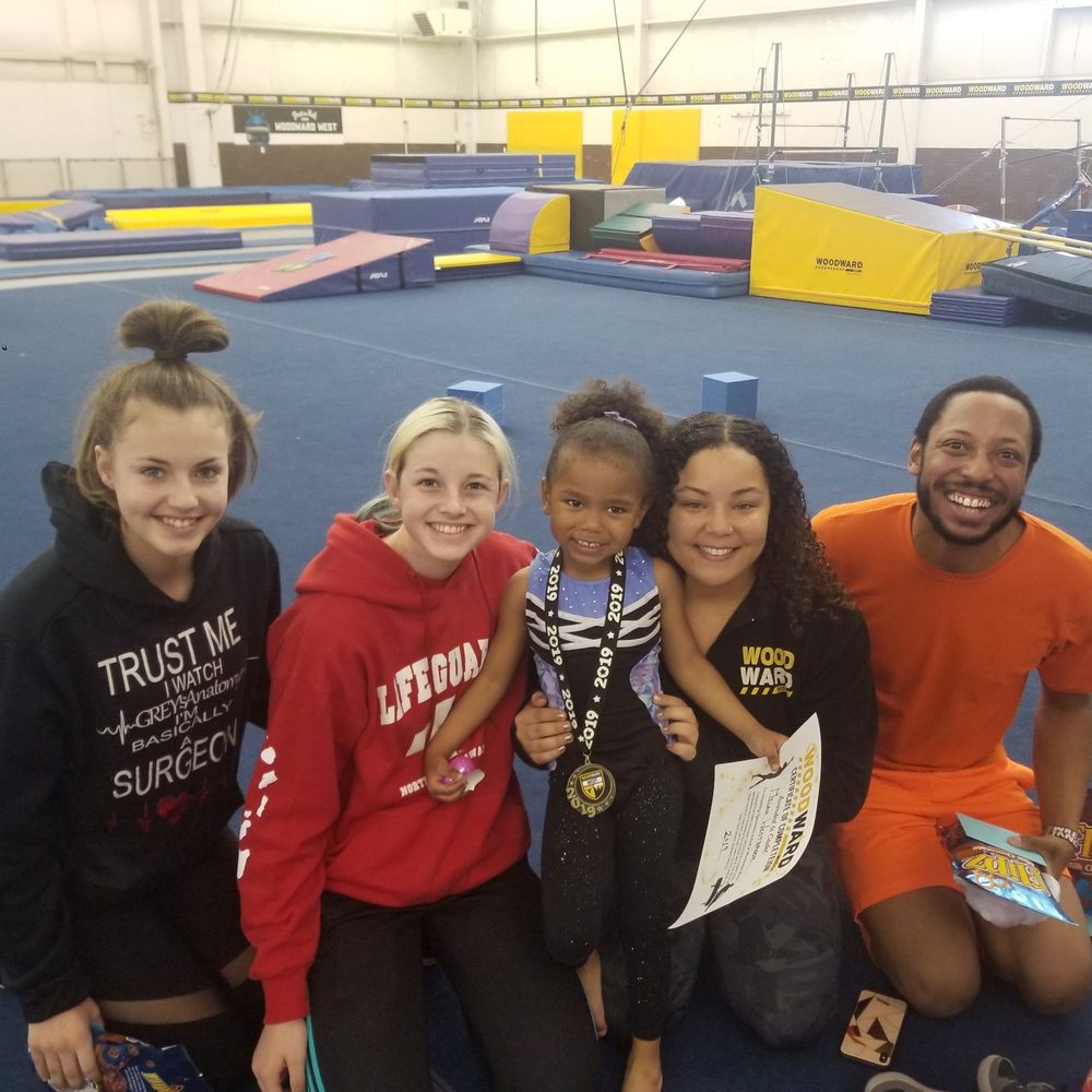 The Amazing teaching staff and My little one with her medal.