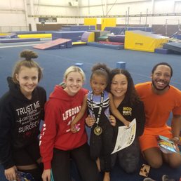The Amazing teaching staff and My little one with her medal.