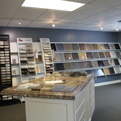 Top Of The World - Stop into our showroom to check out our granite, quartz and solid surface samples.
