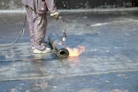 Slide of Alpha Roofing Co