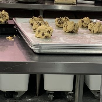 Crumbl - Orem - Scoops of dough.  That's a huge scoop! - Bakeries Near Me - Orem, Utah