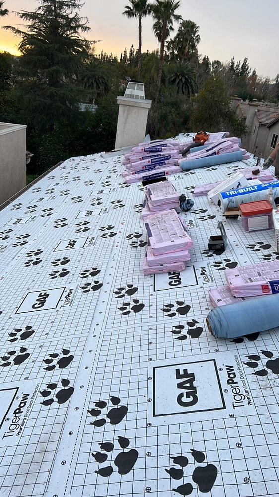 Slide of Alpine Roofing Guys