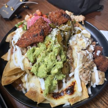 OMG Cocina - Carnitas nachos with my upcharge of fish, surf and turf - Mexican Near Me - Sacramento, California OMG Cocina - Carnitas nachos with my upcharge of fish, surf and turf - Mexican Near Me - Sacramento, California
