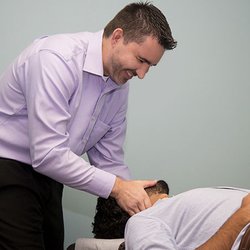 Chiropractic Company of Glendale - Allen Van Scoyk - Chiropractic Adjustment on Patient for Neck Pain and  Headaches and Migraines.