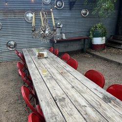 The Butterfly Bar - Lots of outdoor seating and the bar inside also has minored seating. We had a big group and sat at this table.