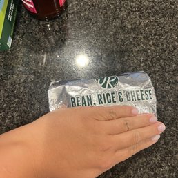 Burrito with hand for comparison