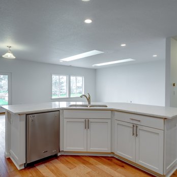 Adair Homes - Caldwell - An open floor concept with the kitchen, dining and living room. - General Contractors Near Me - Caldwell, Idaho Adair Homes - Caldwell - An open floor concept with the kitchen, dining and living room. - General Contractors Near Me - Caldwell, Idaho