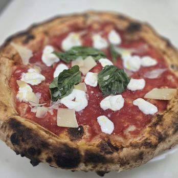 Strega - Margherita Vulcano- black lava sea salt, San Marzano tomato sauce, ricotta, olive oil & fresh basil - Pizza Near Me - Las Vegas, Nevada Strega - Margherita Vulcano- black lava sea salt, San Marzano tomato sauce, ricotta, olive oil & fresh basil - Pizza Near Me - Las Vegas, Nevada