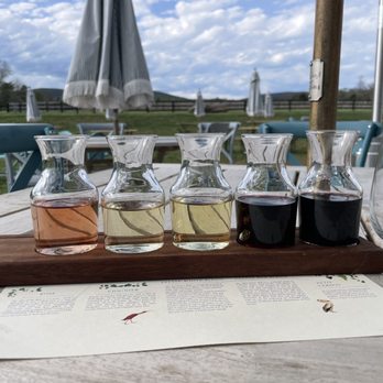 Merrie Mill Farm & Vineyard - Our wine tasting sitting outside on their beautiful patio - Wine Tasting Room Near Me - Keswick, Virginia