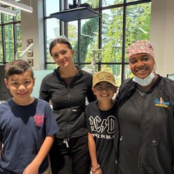 The Kids' Dentist Gig Harbor - Miss Rita and Miss Jaye with the boys