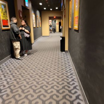 Alamo Drafthouse - two people standing in a hallway - Cinema Near Me - Brooklyn, New York Alamo Drafthouse - two people standing in a hallway - Cinema Near Me - Brooklyn, New York