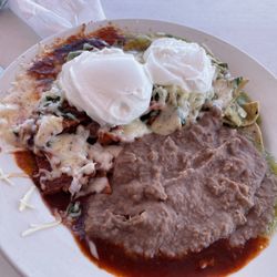 Xochitls - Chilaquiles with red and green sauce, fresh sour cream and frijoles. Could eat it every day!