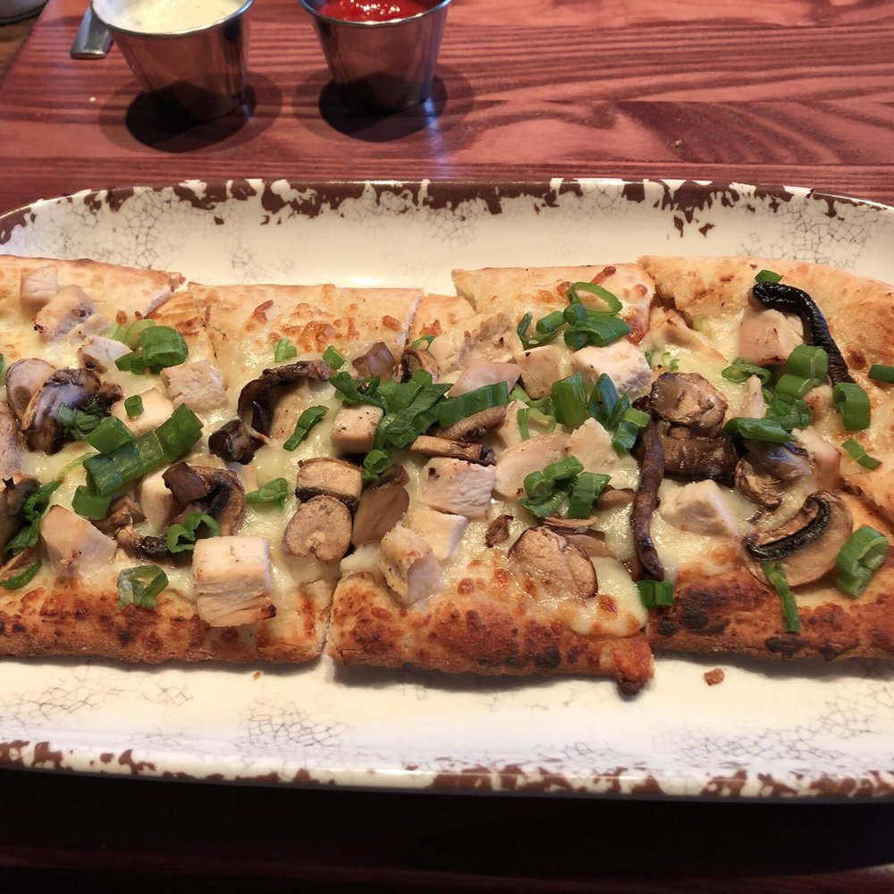 Dragon's Den - Asian chicken flatbread minus the wonton crispy chips and hoisin. - American Near Me - Carlsbad, California Dragon's Den - Asian chicken flatbread minus the wonton crispy chips and hoisin. - American Near Me - Carlsbad, California