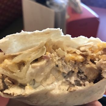 Moe's Southwest Grill - Bacon, Chicken, Sautéed Onions, Shredded Cheese and a Cheese Sauce - Tex-Mex Near Me - Bellmore, New York Moe's Southwest Grill - Bacon, Chicken, Sautéed Onions, Shredded Cheese and a Cheese Sauce - Tex-Mex Near Me - Bellmore, New York