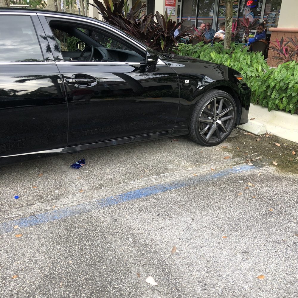 Bob G's Wings and Things - Owner Bob dumping his garbage in the parking lot floor - Chicken Wings Near Me - Sunrise, Florida Bob G's Wings and Things - Owner Bob dumping his garbage in the parking lot floor - Chicken Wings Near Me - Sunrise, Florida