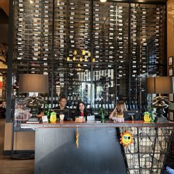 Stone Werks Big Rock Grille at The Rim - Front desk and wine cellar wall