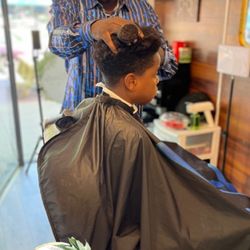 Uptown Beauty Salon - Haircut by LA