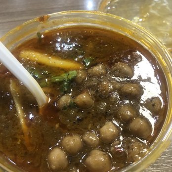 Taaza Taste - a bowl of soup with a spoon in it - Indian Near Me - Brampton, Ontario Taaza Taste - a bowl of soup with a spoon in it - Indian Near Me - Brampton, Ontario