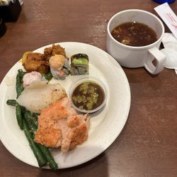 My first plate (note the baked salmon and baked white fish) and my hot and sour soup.