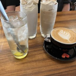 Coconut frappe, chai frappe, cafe latte, and an Italian soda Coconut frappe, chai frappe, cafe latte, and an Italian soda