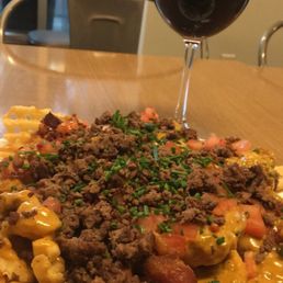Loaded waffle fries with Ground Elk meat. Loaded waffle fries with Ground Elk meat.