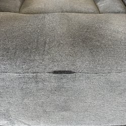 Lexington Overstock Warehouse - Ripped fabric