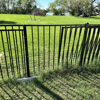 Texan Fence and Construction - "Gate" supposed to be here but is just a fence panel, zip-tied in place. - General Contractors Near Me - Alvin, Texas Texan Fence and Construction - "Gate" supposed to be here but is just a fence panel, zip-tied in place. - General Contractors Near Me - Alvin, Texas
