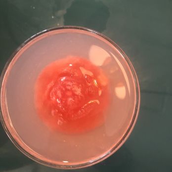 Louie Louie - White cosmo with floating frozen cranberry rose - New American Near Me - Philadelphia, Pennsylvania