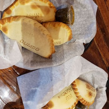 Empanola - Our choices, each stamped with their flavor. - Empanadas Near Me - New Orleans, Louisiana Empanola - Our choices, each stamped with their flavor. - Empanadas Near Me - New Orleans, Louisiana