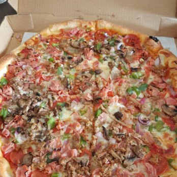 Genovese's Italian Cafe - Large cafe combo pizza. It's big too. Not the chain store large - Italian Near Me - Ormond Beach, Florida Genovese's Italian Cafe - Large cafe combo pizza. It's big too. Not the chain store large - Italian Near Me - Ormond Beach, Florida