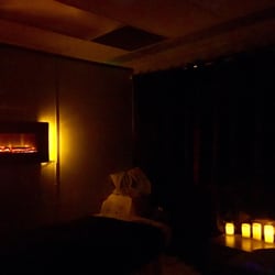 Interlude Skin Care & Massage - Massage room with lights off