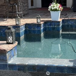 My Favorite Pool Guy - Before replacement of spillway tiles