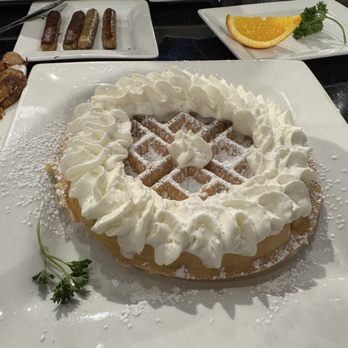 Keke's Breakfast Cafe - Belgian Waffle w/whipped cream and powdered sugar - Breakfast & Brunch Near Me - Orlando, Florida Keke's Breakfast Cafe - Belgian Waffle w/whipped cream and powdered sugar - Breakfast & Brunch Near Me - Orlando, Florida