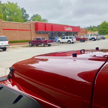 QuikTrip - a red truck parked in a parking lot - Gas Stations Near Me - Buford, Georgia QuikTrip - a red truck parked in a parking lot - Gas Stations Near Me - Buford, Georgia