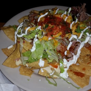 Jim 'N Nick's Bar-B-Q - Nachos with pulled pork - Barbeque Near Me - Smyrna, Tennessee Jim 'N Nick's Bar-B-Q - Nachos with pulled pork - Barbeque Near Me - Smyrna, Tennessee