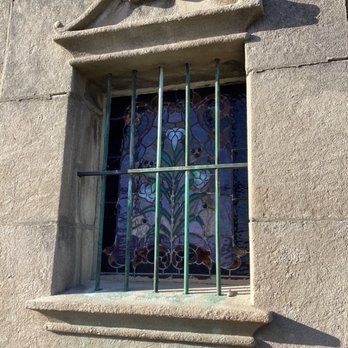 Mt Carmel Catholic Cemetery - Stain glass window on the side of the Rousseau mausoleum - Funeral Services & Cemeteries Near Me - Hillside, Illinois Mt Carmel Catholic Cemetery - Stain glass window on the side of the Rousseau mausoleum - Funeral Services & Cemeteries Near Me - Hillside, Illinois