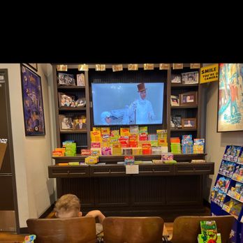 Cravin's Candy Emporium - a young boy watching tv - Desserts Near Me - Bend, Oregon Cravin's Candy Emporium - a young boy watching tv - Desserts Near Me - Bend, Oregon