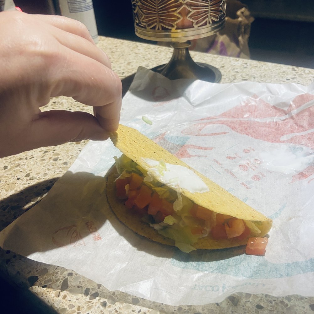 Taco Bell - Hard taco which had no cheese and the sour cream was in the wrong position on the taco. - Fast Food Near Me - Noblesville, Indiana