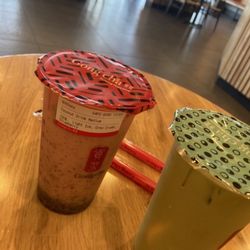 Gong Cha - L: coconut/strawberry with Oreo crumble 100% sweet R: matcha/coconut with pudding 70% sweet