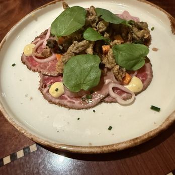 Carthay Circle Restaurant - Mushroom and Herb Crusted Beef CarpaccioCarpaccio - New American Near Me - Anaheim, California