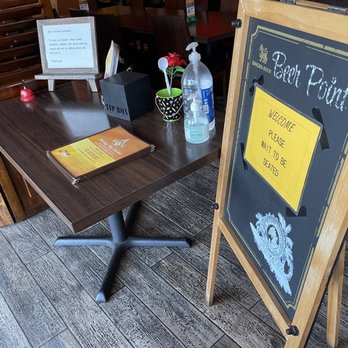 Sizzling Thai Kitchen - a table with a menu on it - Thai Near Me - Downey, California Sizzling Thai Kitchen - a table with a menu on it - Thai Near Me - Downey, California